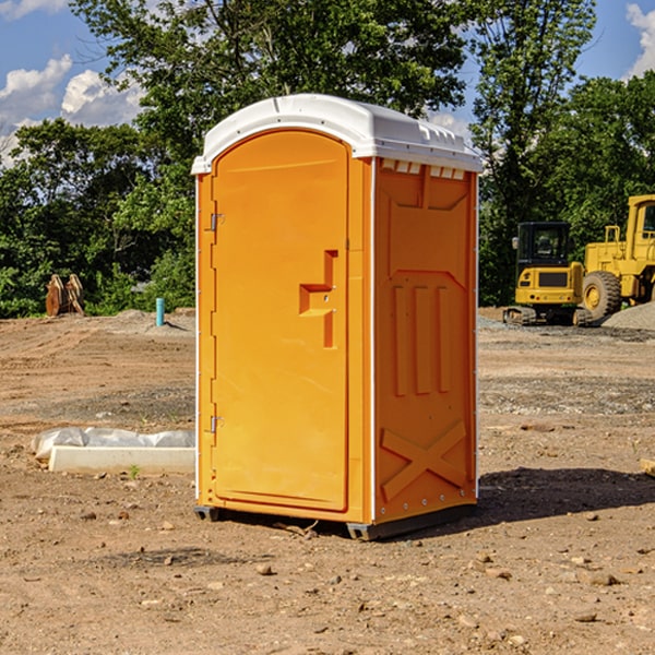 how often are the portable restrooms cleaned and serviced during a rental period in Helmsburg IN